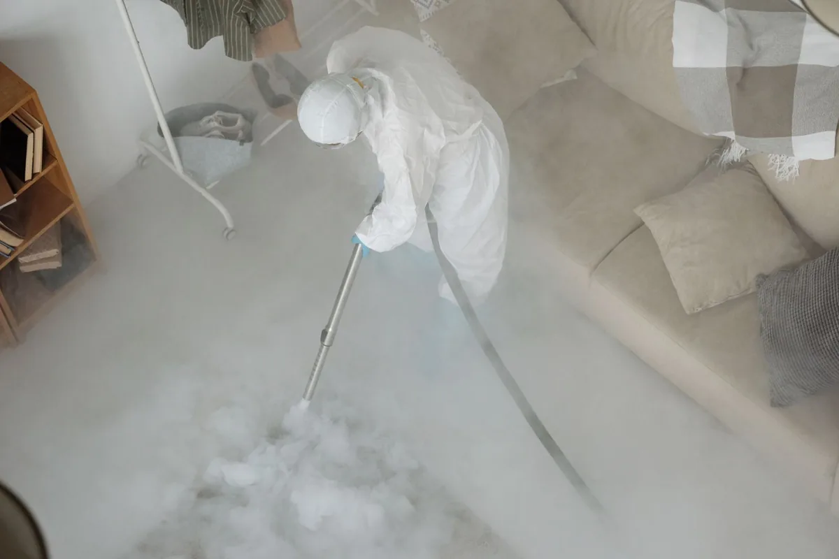 Biohazard cleanup technician in protective equipment, Almont, MI